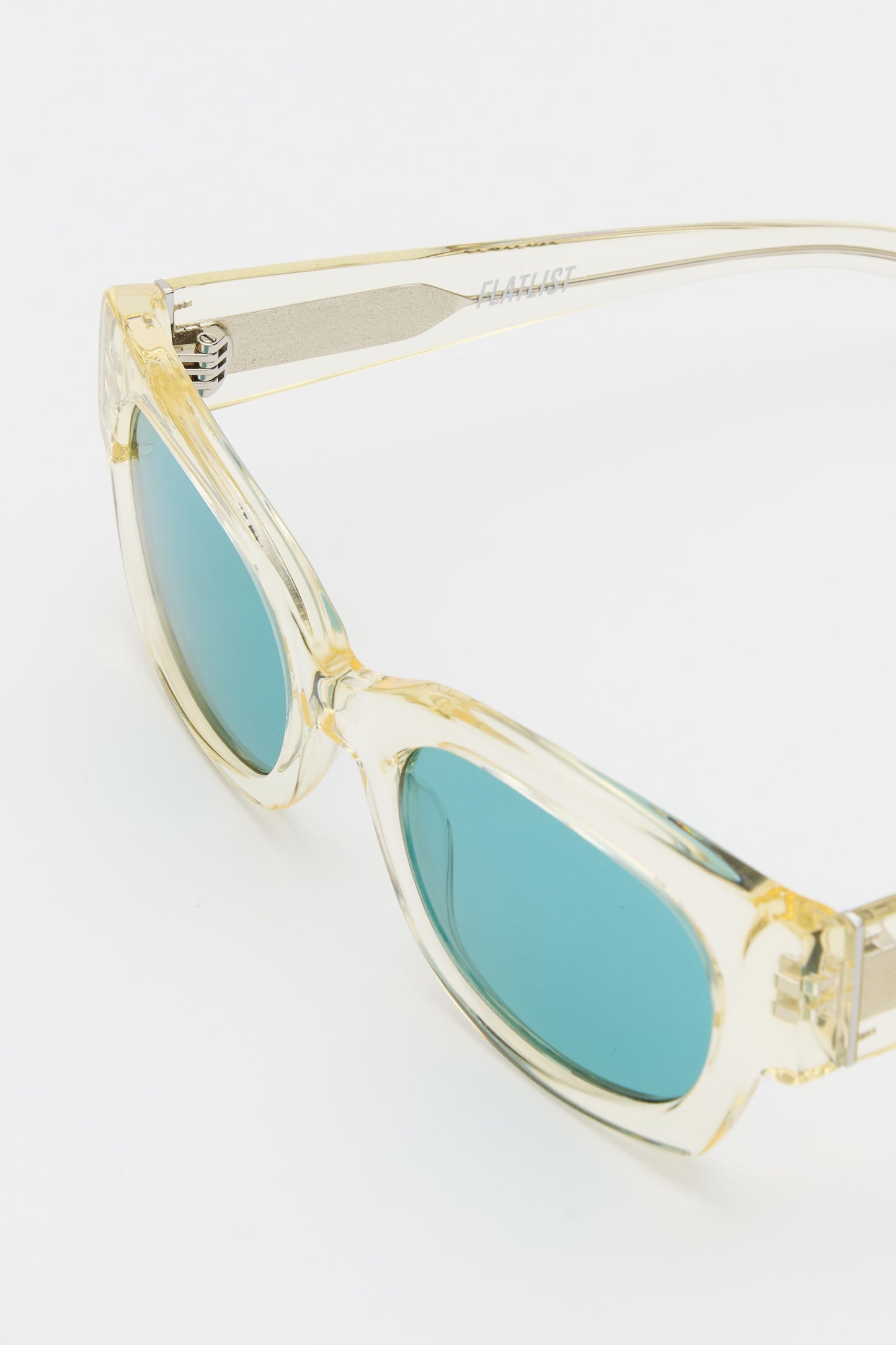 SHADE 01 Crystal Yellow / Solid Teal Lens