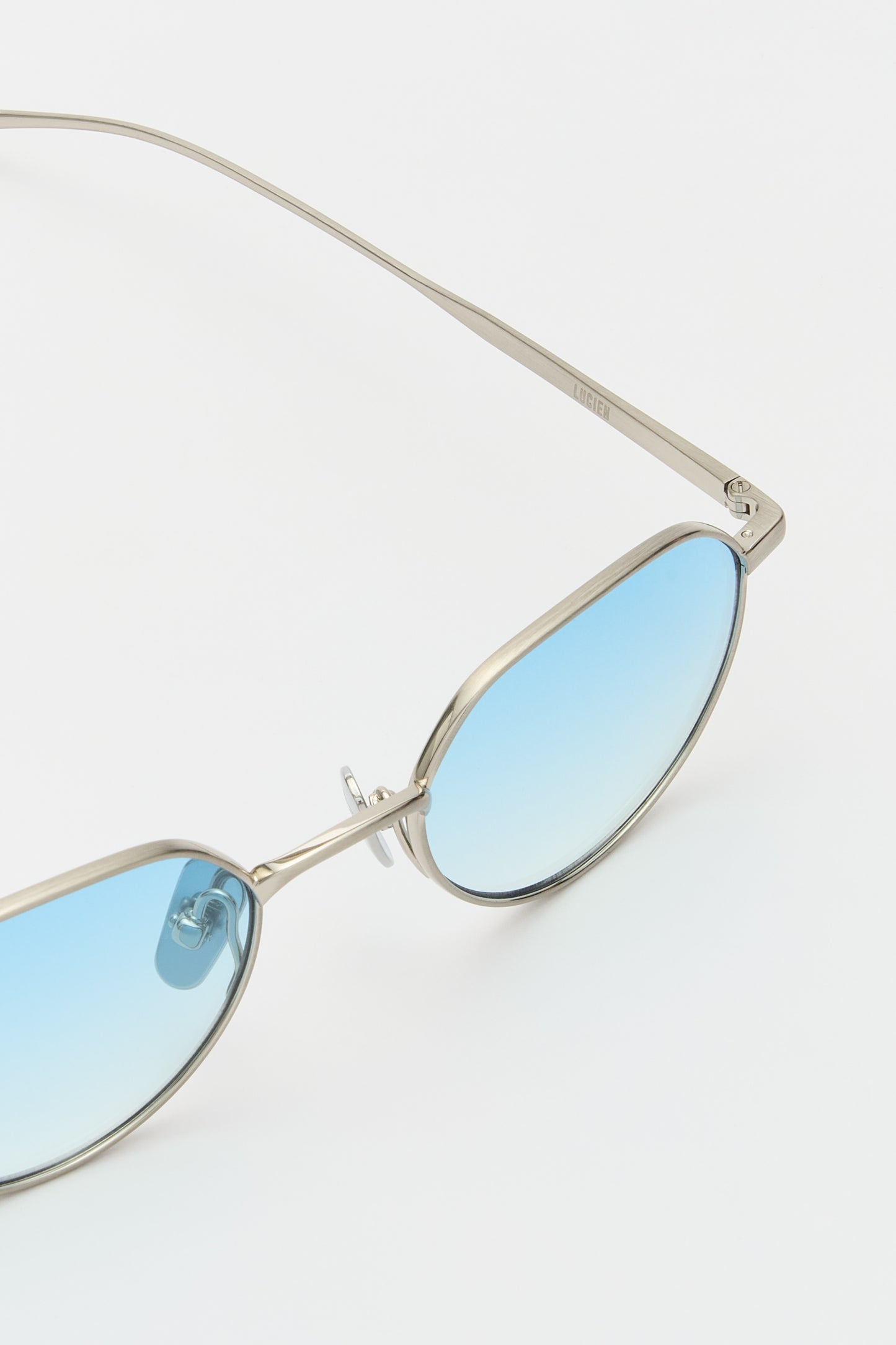 LUCIEN Brushed Silver / Light Blue Lens