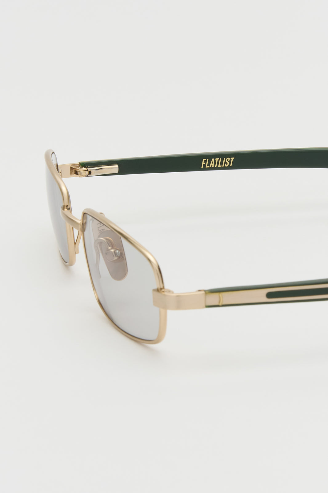 STING Brushed Gold / Solid Dark Green / Light Grey Lens